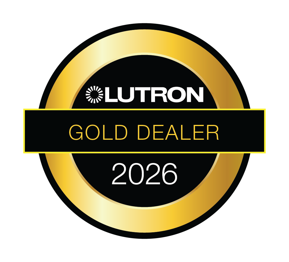 A circular authorized LUTRON Gold Dealer 2026 badge with a black center, white and black text, and a metallic gold outer ring on a white background.